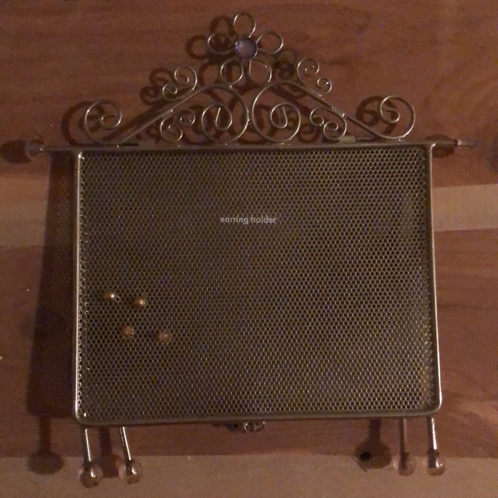 Claire’s silver earrings holder